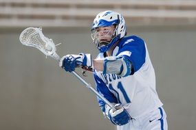 lacrosse, young player with ball on stick