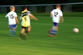 children are playing football