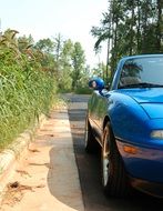 side of blue mazda sports car, miata mx-5