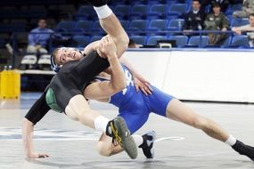 male wrestlers on the sports ground