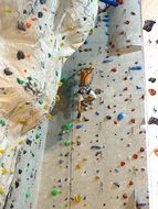 strong man on the climbing wall
