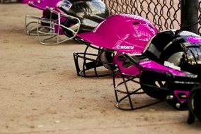 baseball helmets lie on the ground