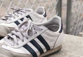 weathered menâs adidas sneakers