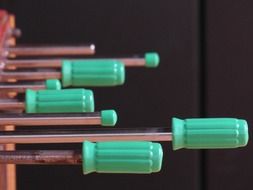 revolving handles of a table football close-up