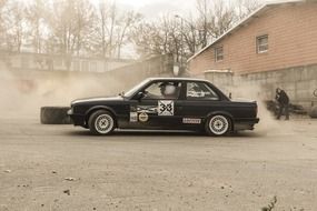 black sports car at speed