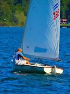 photo of the sailing boat on a water