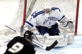 ice hockey goalkeeper in helmet