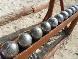 row of silver bowling balls