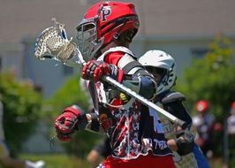 lacrosse player in red helmet