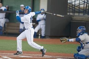 baseball player hit the ball