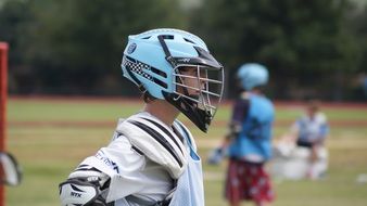 player in helmet while playing