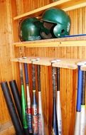 wooden cabinet for baseball accessories