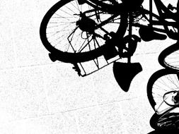 Black and white image of a silhouette of a bicycle