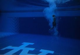 swimmer underwater in the pool