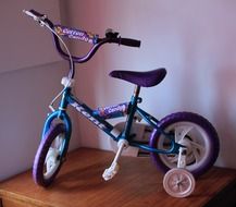 four-wheeled children bicycle