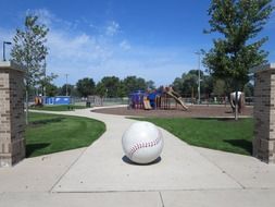 baseball statue in a park