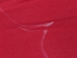 salt from sweat on red cloth