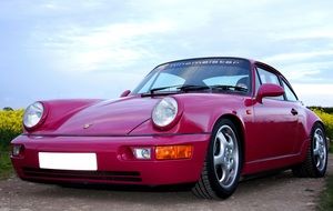purple porsche carrera car