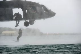 jumping from a helicopter into the water