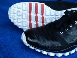 new black sneakers with white sole