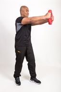 fitness trainer with a circle in his hands