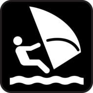silhouette of a surfer on a black background