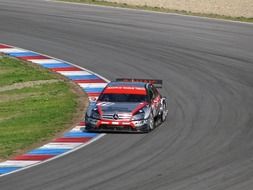 racing car on the edge of the track