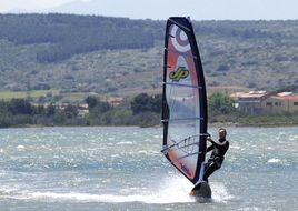 windsurfing on a sea