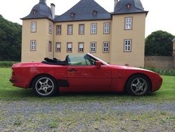 red sports car at house, porsche 944