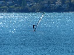 lonely surfer on a water