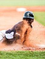 dirty baseball player on the field at a game in Venezuela