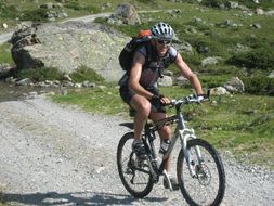 cyclist on the mountain path