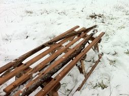 wooden sled on snow