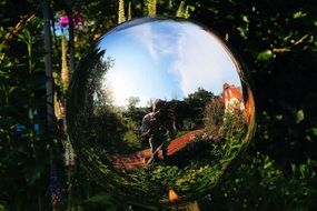 mirroring ball in a garden