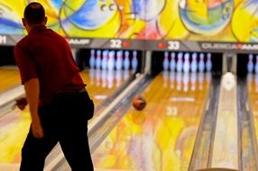 man on bowling alley