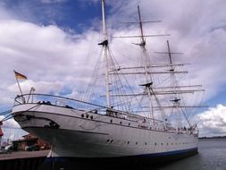 ship with masts at sea