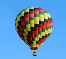 Colorful balloon in flight