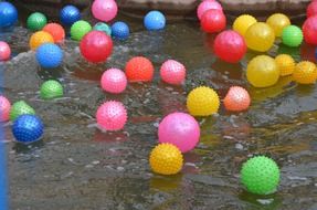 colored balls on the water