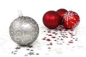 one silver and three red Christmas balls