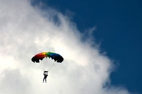 skydiver on a white cloud background