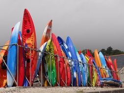 colored surfboards on the beach
