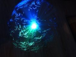 round lamp with blue-green light