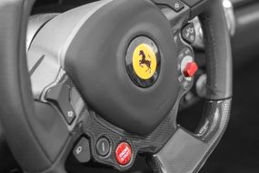 Car steering wheel with Ferrari logo