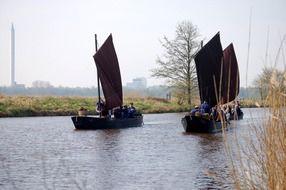 three sailing boats on the river