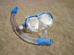 diving mask on the beach