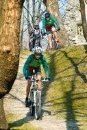 cyclists on the track in the countryside