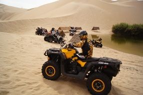 ATV riding in the sand