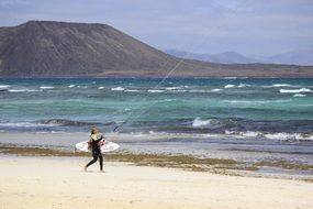 Doing kitesurfing near the water