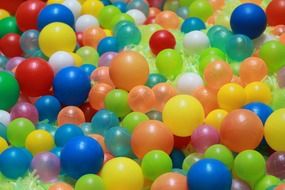 pile of colorful balls in pool on playground