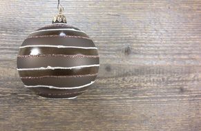 black and white photo of christmas toy with stripes